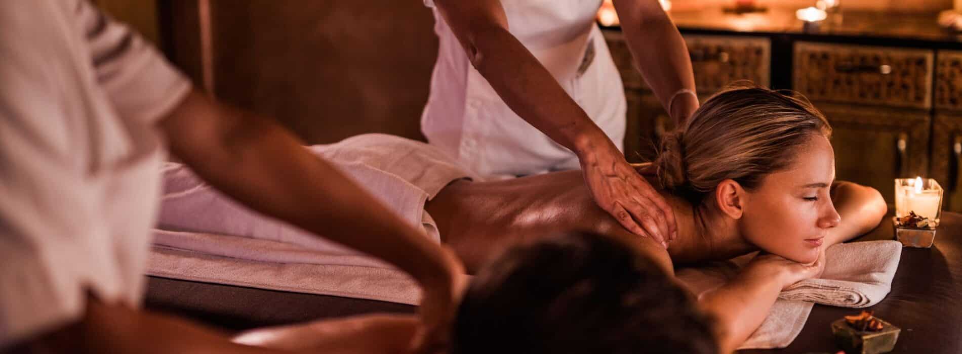 A couple getting massages.