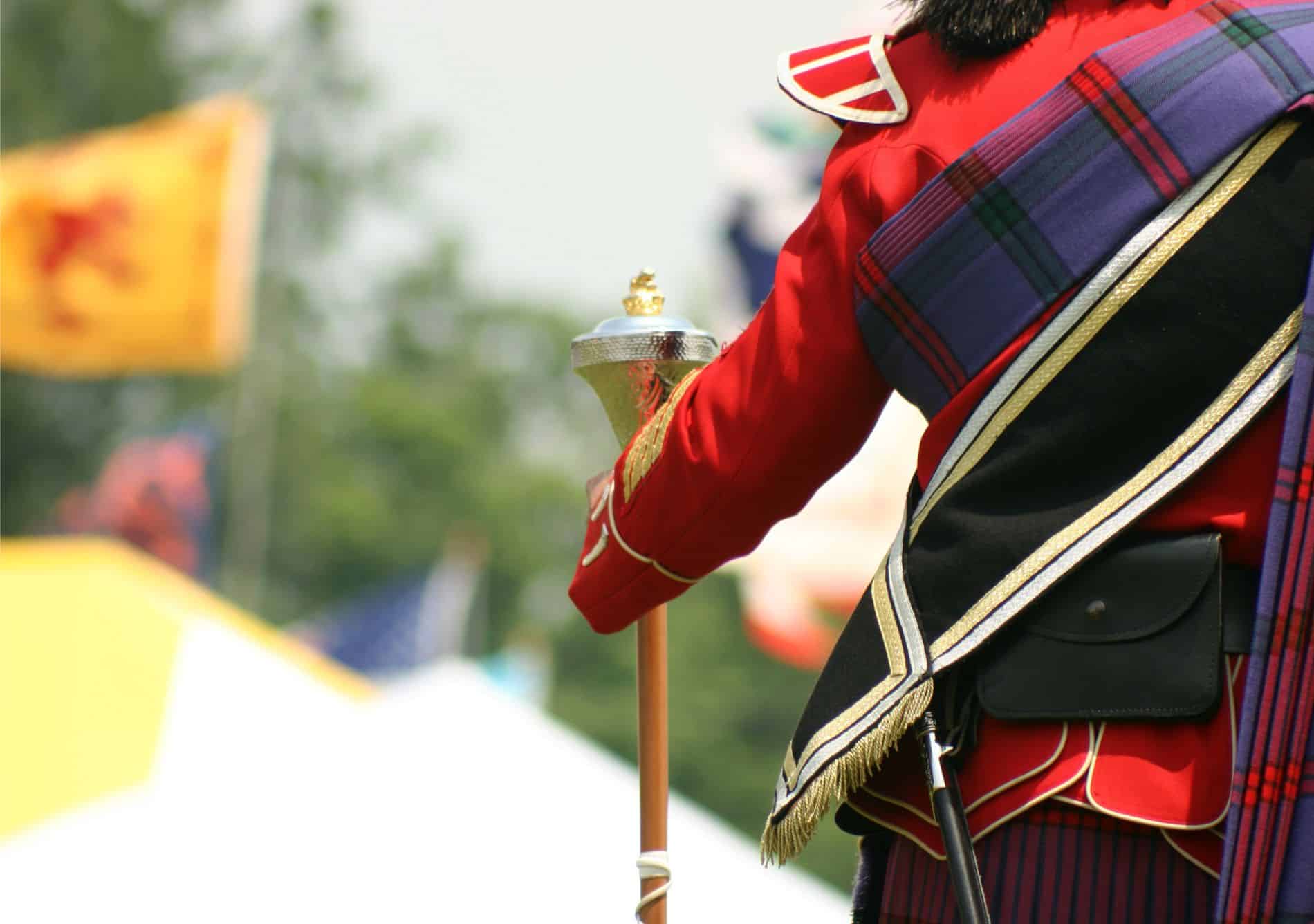 a person dressed up to play in the highland games