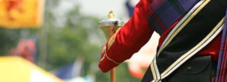 a person dressed up to play in the highland games