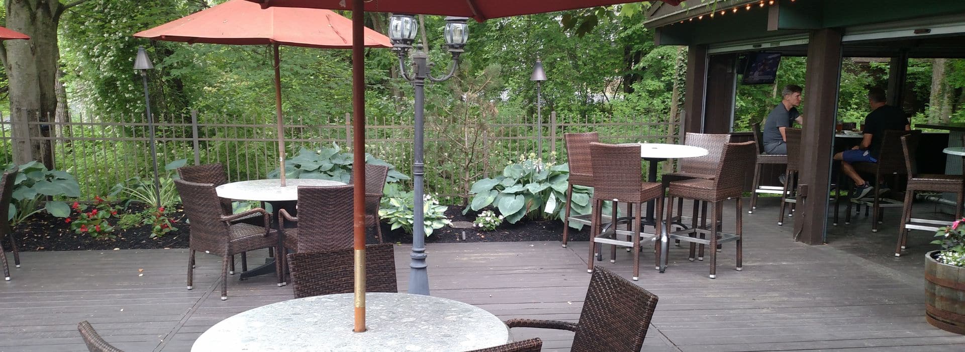 outdoor dining area showing tables with umbrellas