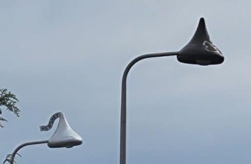 Two street lights in the shape of Hershey Kisses