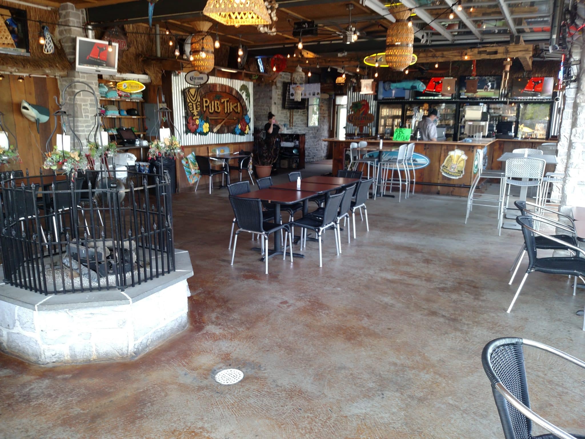 pub tiki section of restaurant showing bar and tables